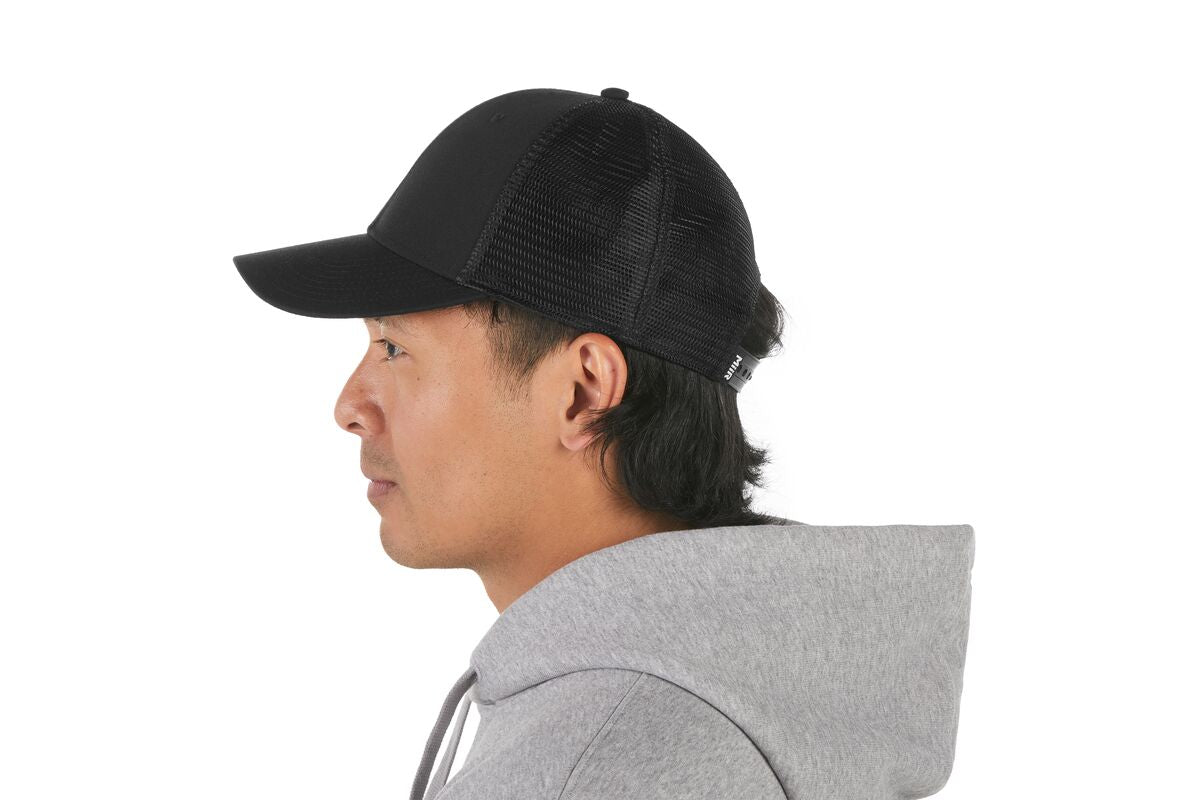 recycled-poly-low-profile-trucker-hat-e1 WebPDP-HAT002002_Recycled_Poly_Low_Profile_Trucker_Hat_Black_Studio_Harper_Studios_0723_Back__HAT002002OS.jpg